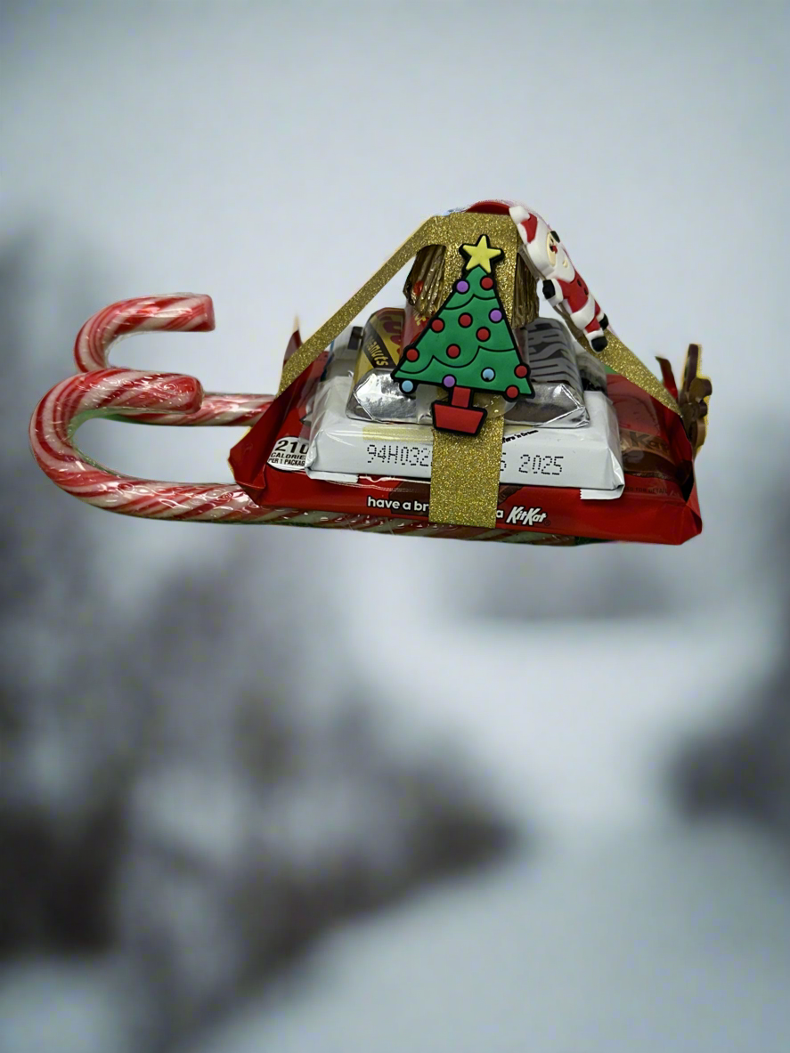 Santa on assorted chocolate candy Sleigh