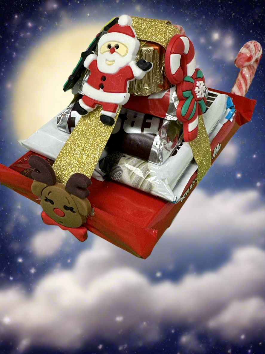 Santa on assorted chocolate candy Sleigh