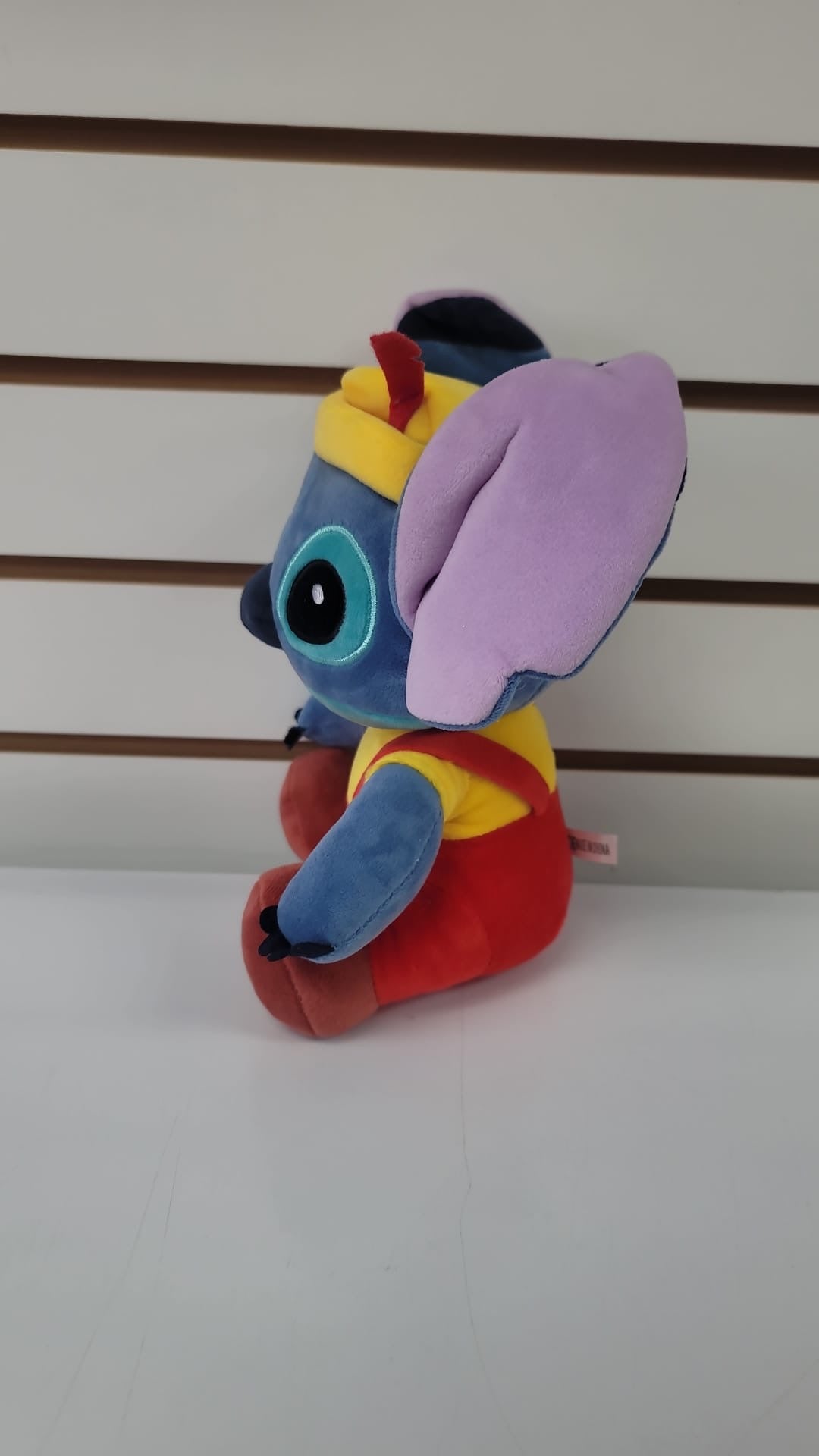 Plush stitch with red overalls