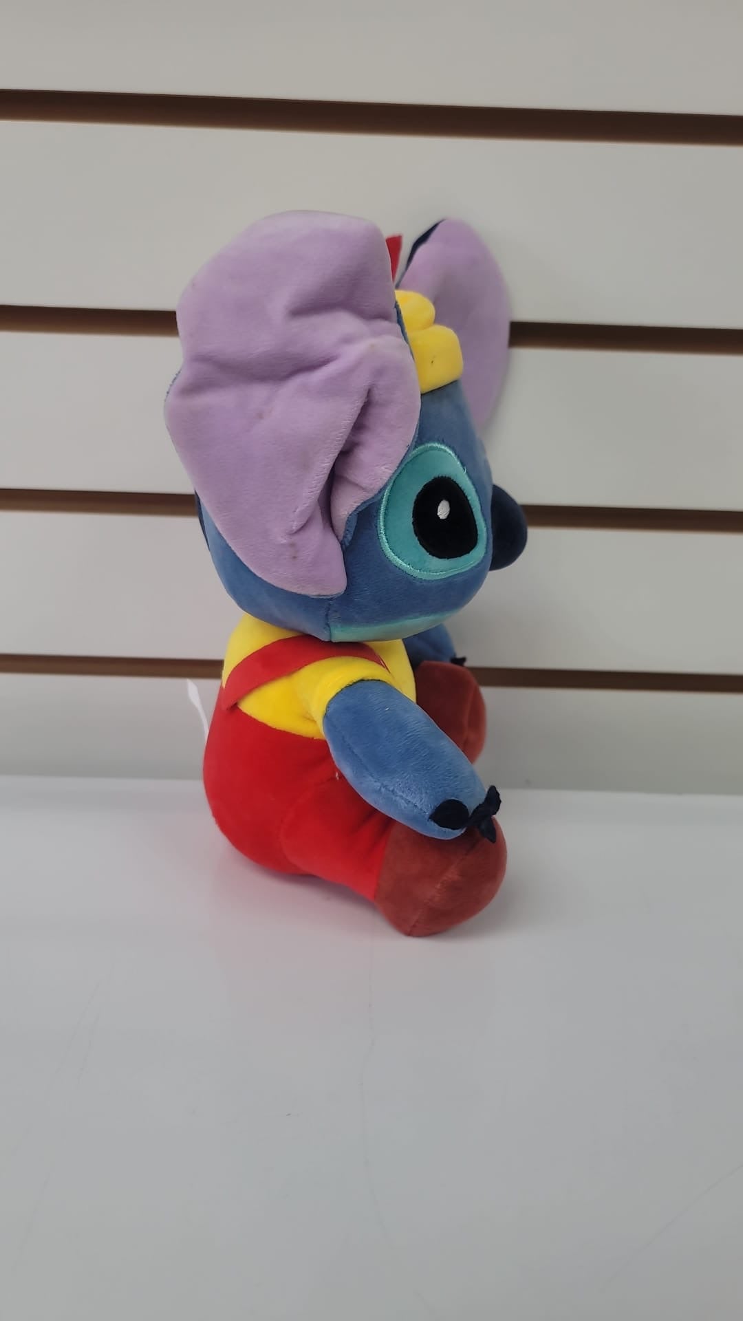 Plush stitch with red overalls