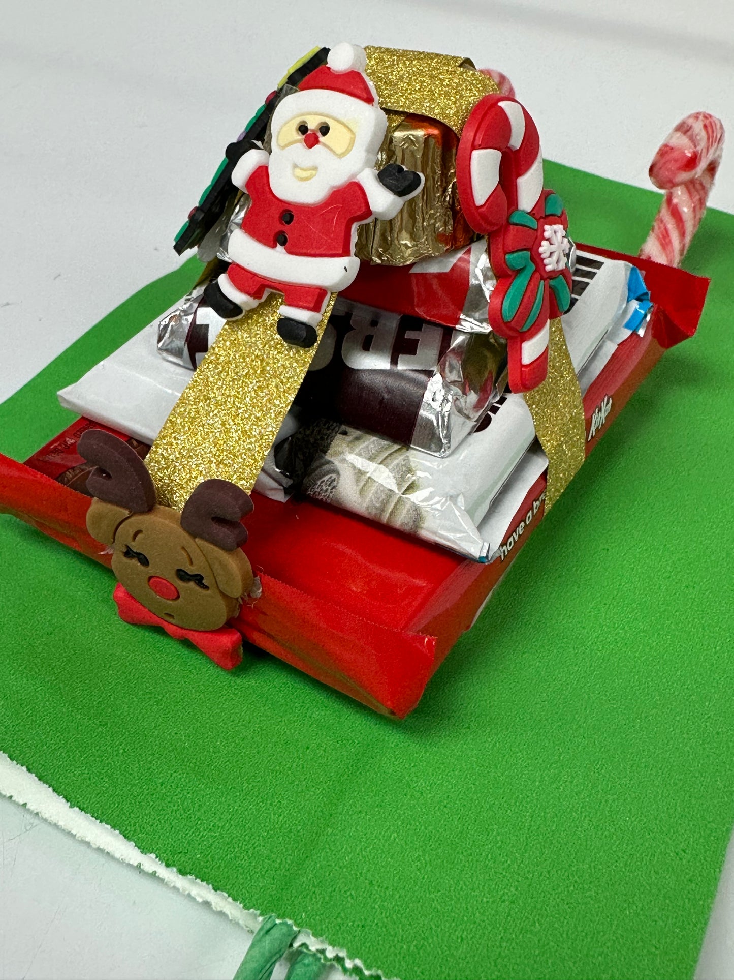 Santa on assorted chocolate candy Sleigh